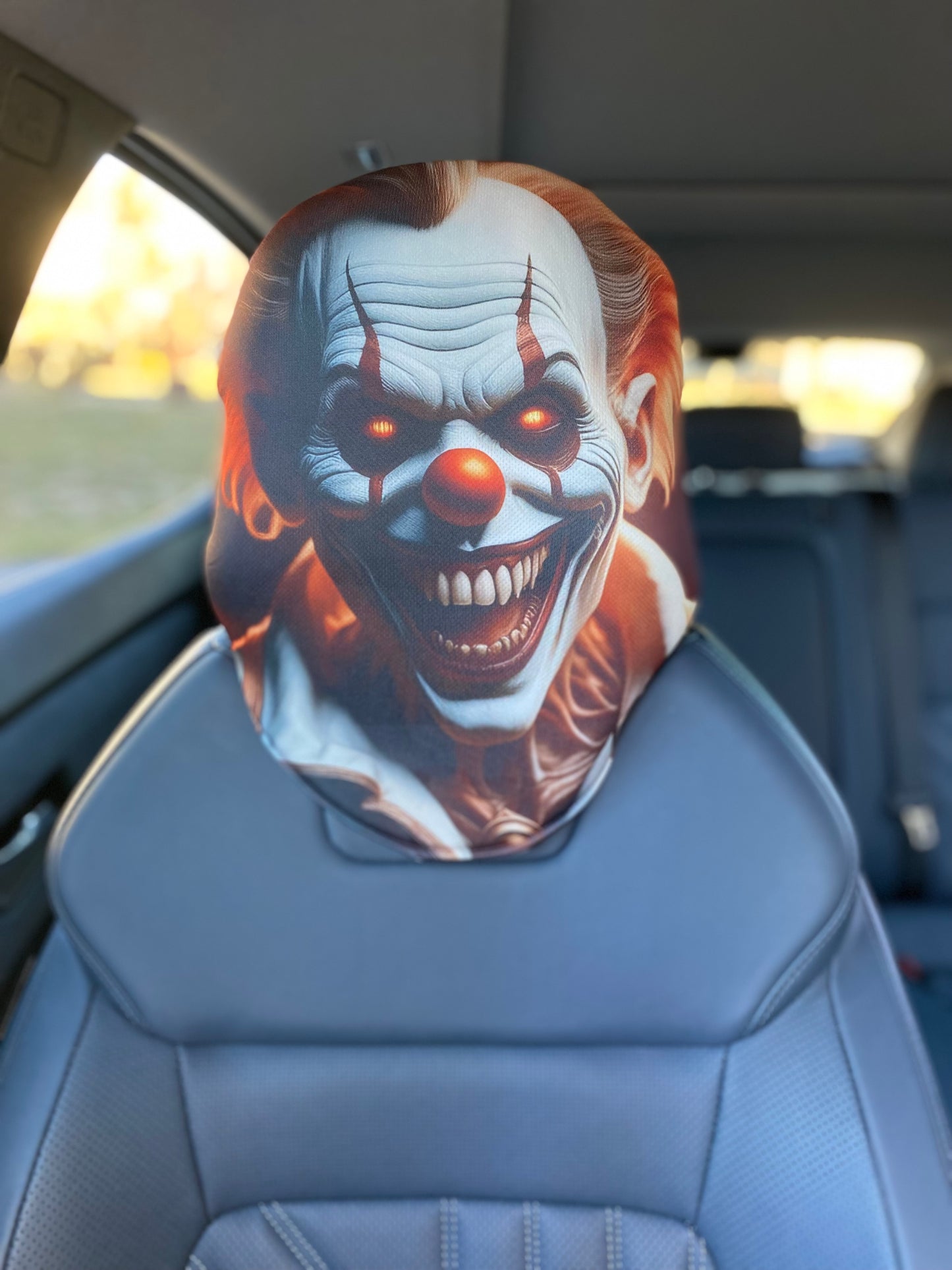 Chuckles – Creepy Clown Car Headrest Cover by HeadzRest