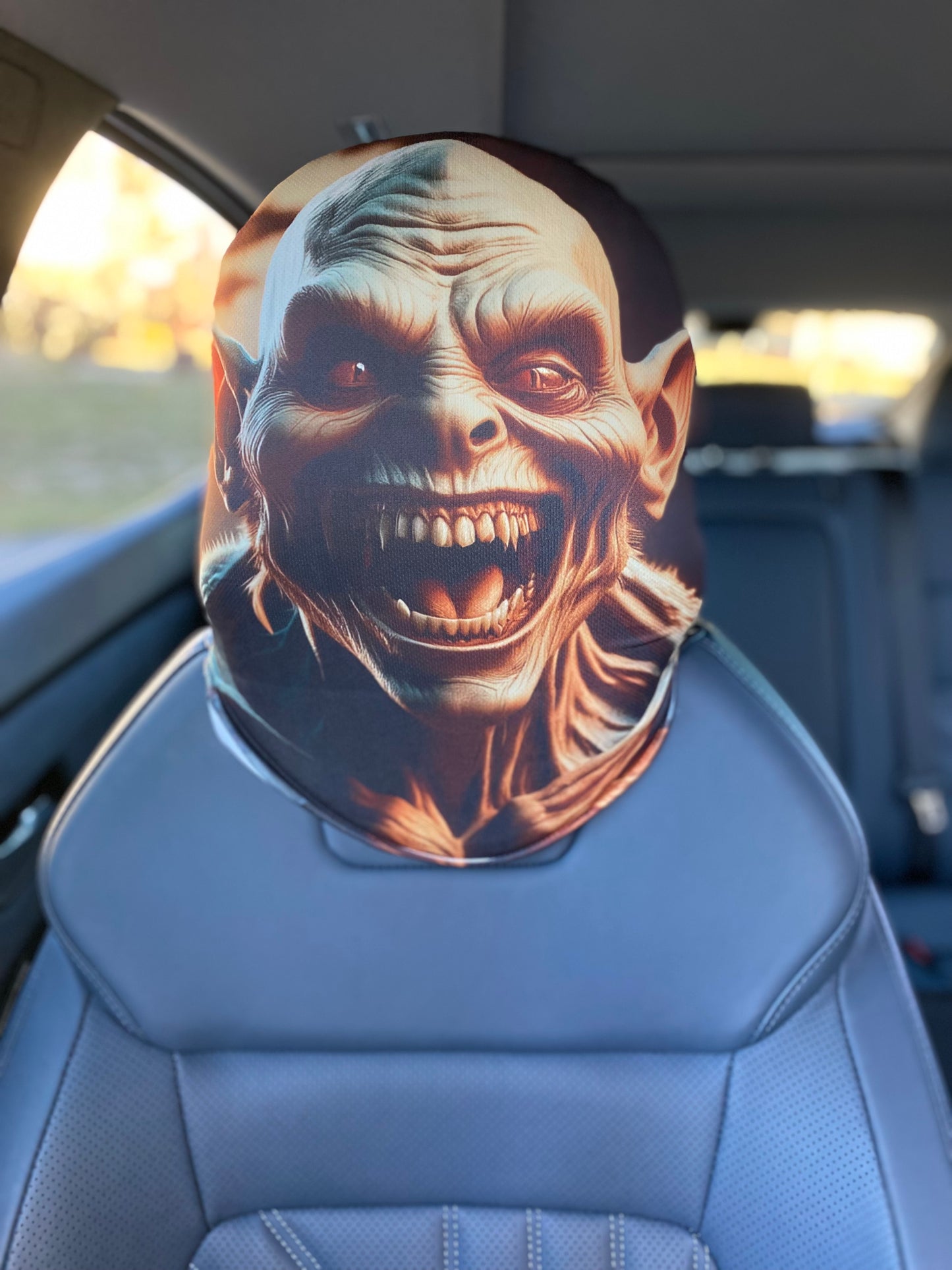 Grinning Ghoul – Halloween Horror Car Headrest Cover by HeadzRest